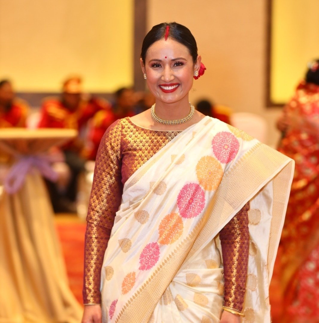 Diya Maskey background portrait