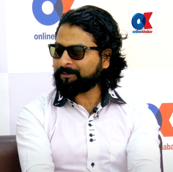 Mukul Bhusal background portrait